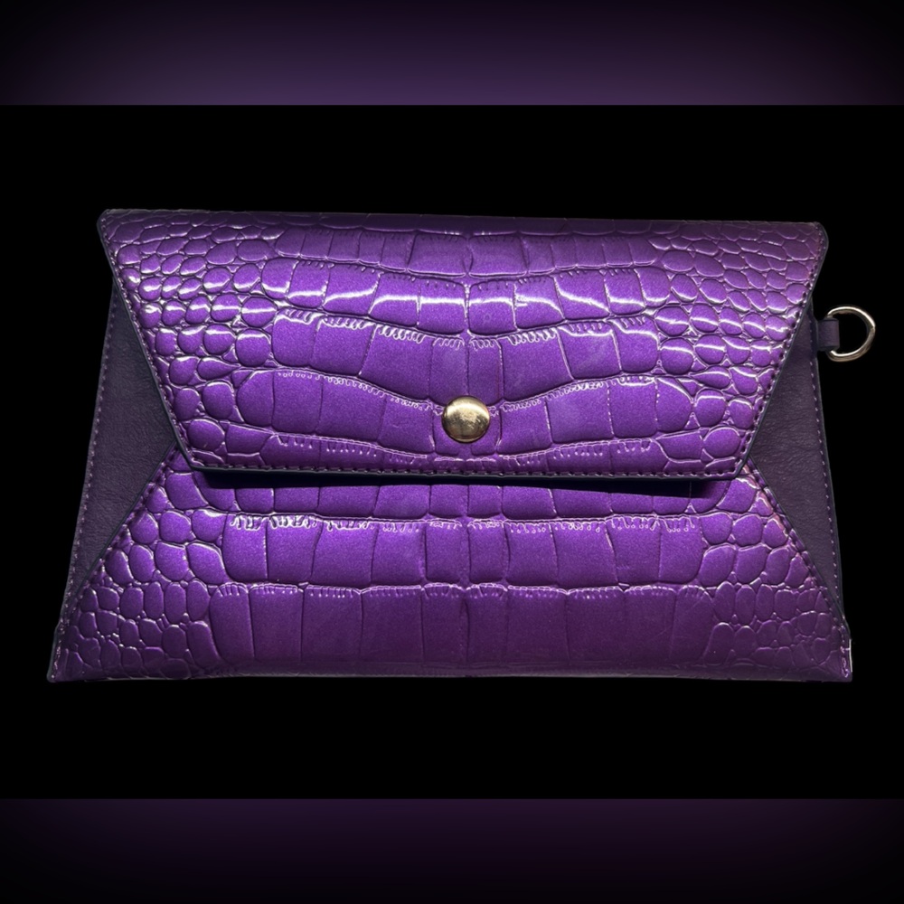 Purple alligator print clutch